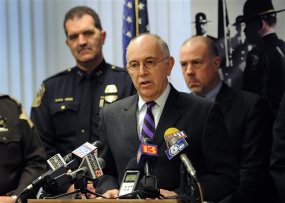 Marion County Prosecutor Terry Curry speaks Thursday during a news conference regarding the murder of Indianapolis Metropolitan Police Department Officer David Moore. Prosecutors announced charges against 60-year-old Thomas Hardy, a convicted felon they say fatally shot Moore during a traffic stop.